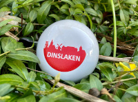 Fahrradklingel mit dem Logo der Stadt Dinslaken drauf